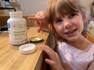 child with vitamins