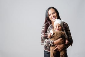 smiling mother and baby