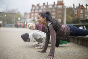 people exercising in park
