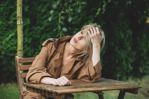 Tired woman with oxidative stress