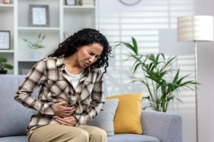 woman with gut pain