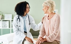 doctor explaining gut inflammation testing to patient