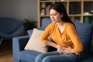 woman with gut pain